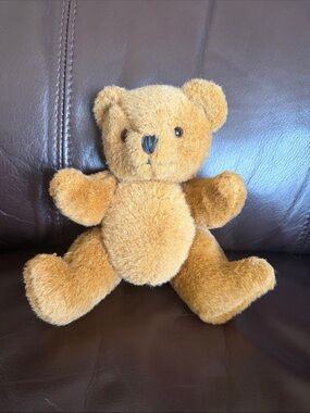 This is a vintage jointed teddy bear from PBC International 6 1/2 inches high